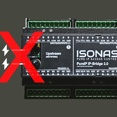 A door controller with graphics marking an incorrect power connection.