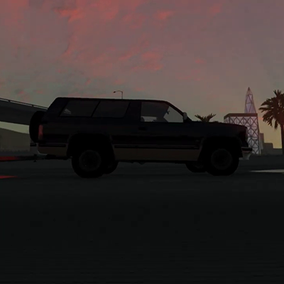 A 1980s sedan on a test track in a vehicle simulator.
